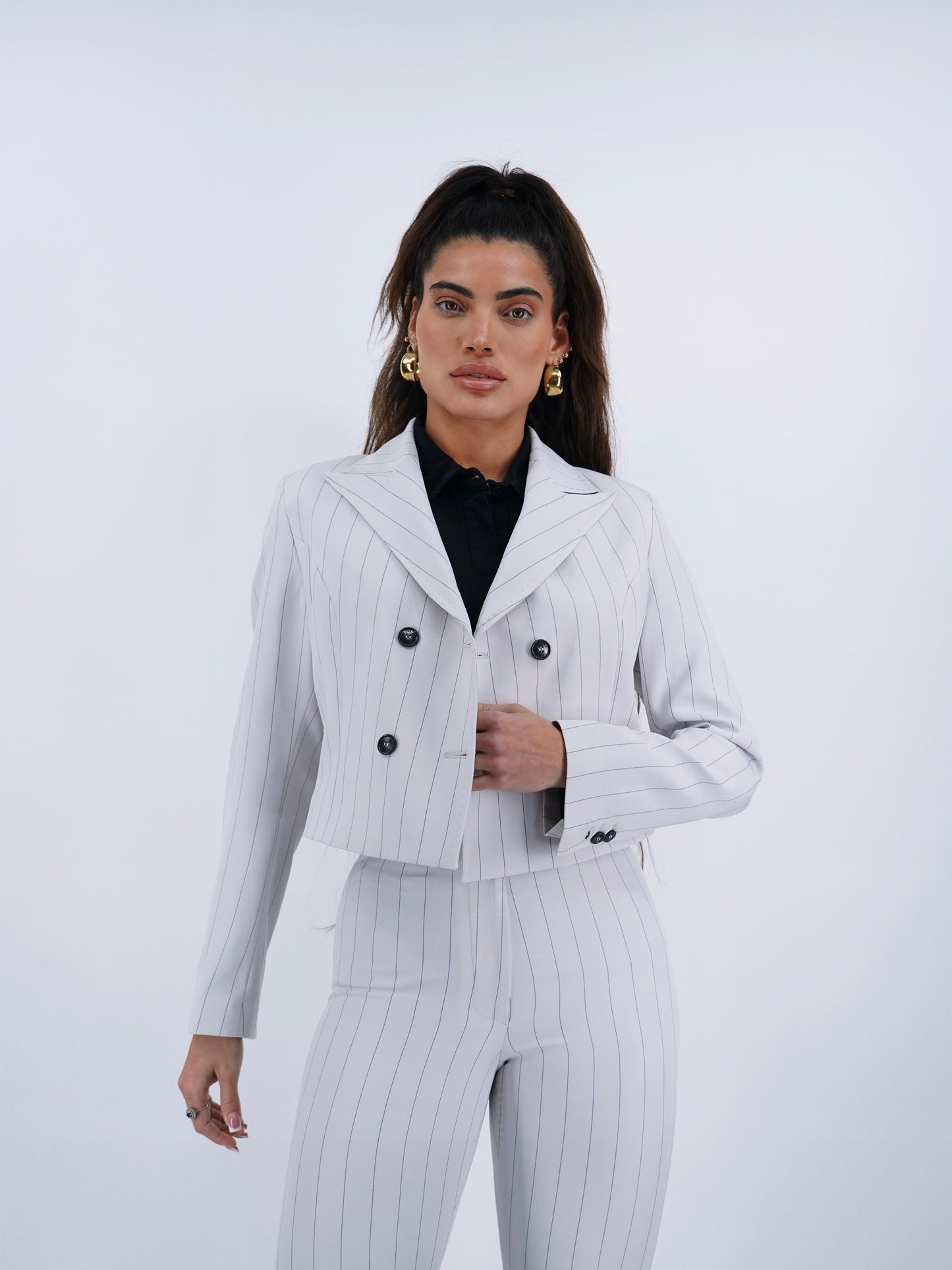 Tailleur doppiopetto bianco gessato .