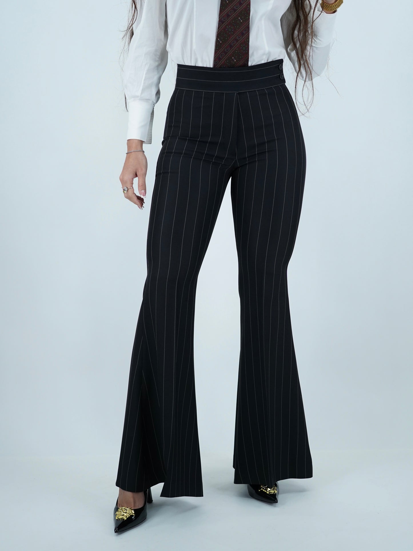 Tailleur doppiopetto nero gessato .